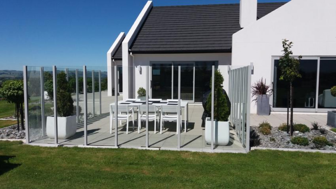 SetWidth850 From a distance this Edge balustrade windbreak enhances the view with its clear screens